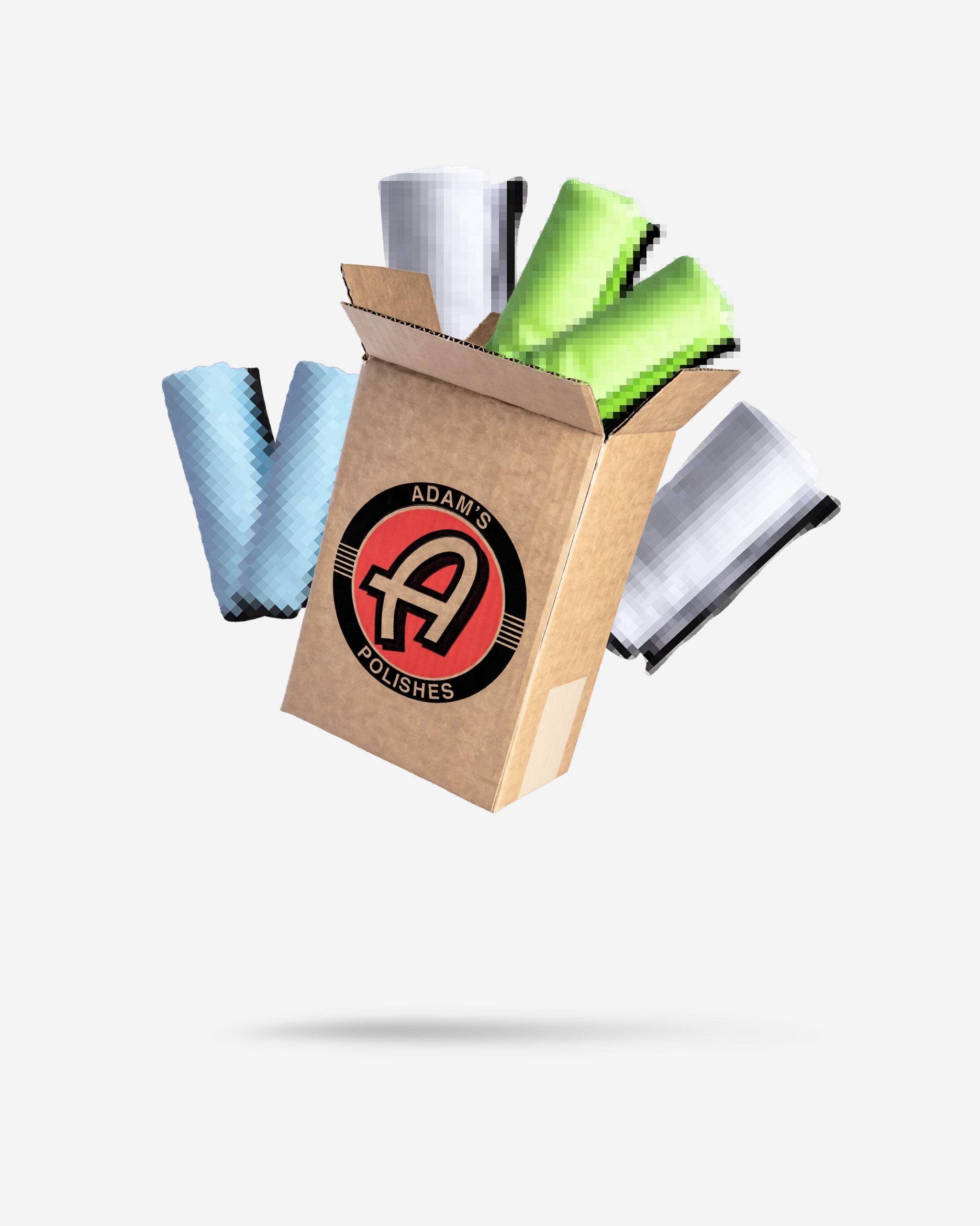 Alt text: "Adam's Polishes $29.99 Mystery Microfiber Box containing a variety of colored microfiber towels spilling out, featuring the company's logo on the front of the cardboard packaging."